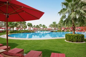 Outdoor pool, open 7:00 AM to 8:00 PM, pool umbrellas, pool loungers - Khalidiya Palace Rayhaan by Rotana (Abu Dhabi)