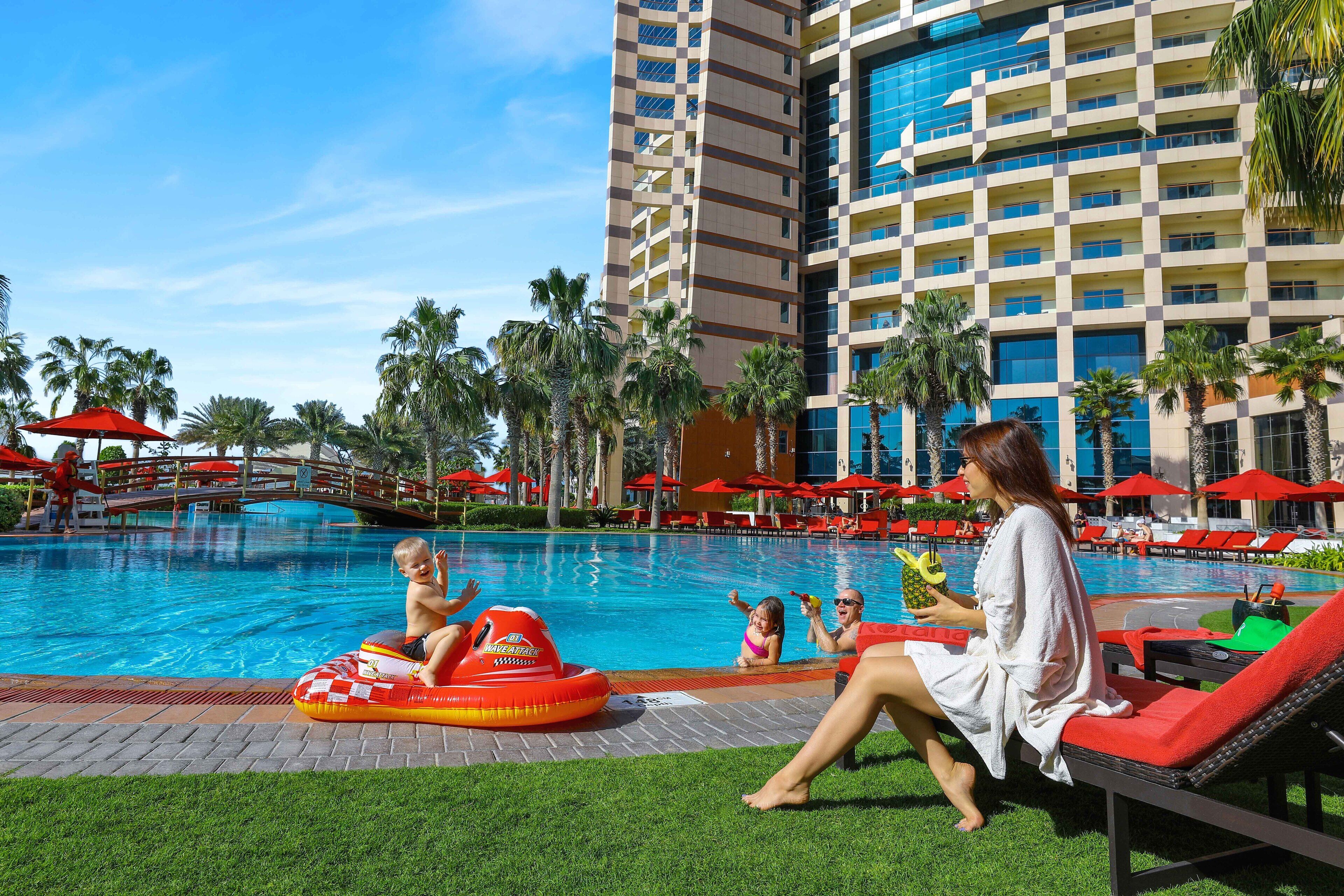 Outdoor pool, open 7:00 AM to 8:00 PM, pool umbrellas, pool loungers