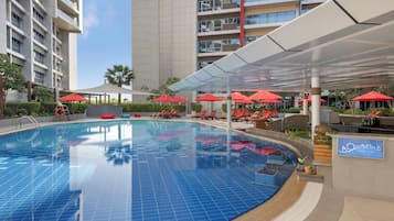 Outdoor pool, open 6:00 AM to 10:00 PM, free pool cabanas