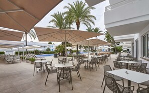 Breakfast, dinner served; international cuisine, pool views