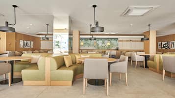 Breakfast, dinner served; international cuisine, pool views