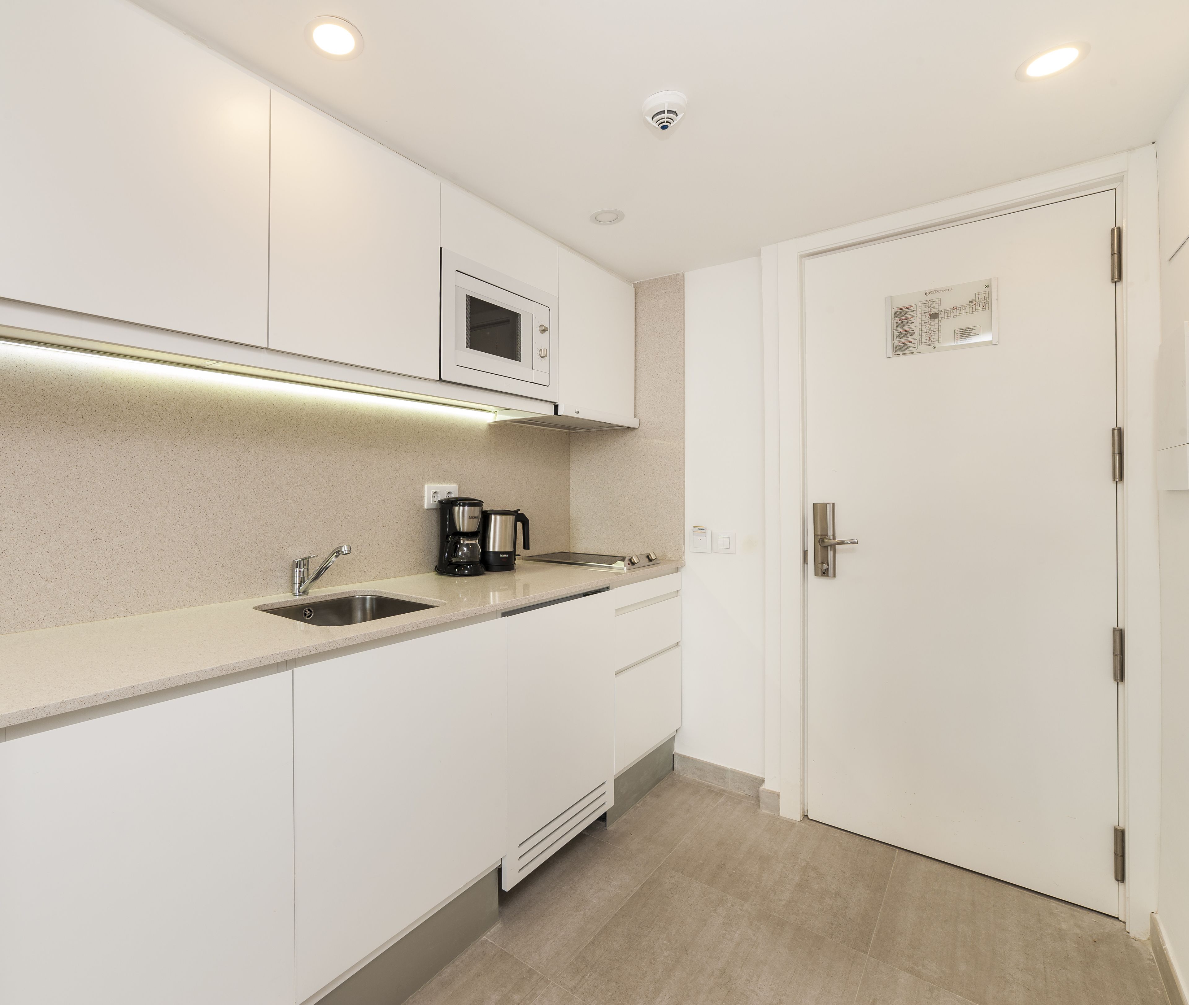 mini-fridge, microwave, coffee/tea maker, electric kettle