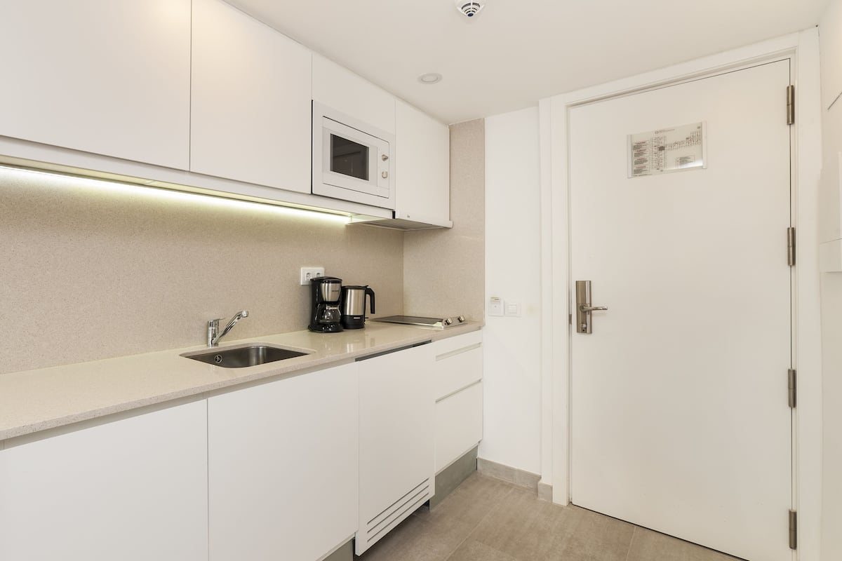 mini-fridge, microwave, coffee/tea maker, electric kettle