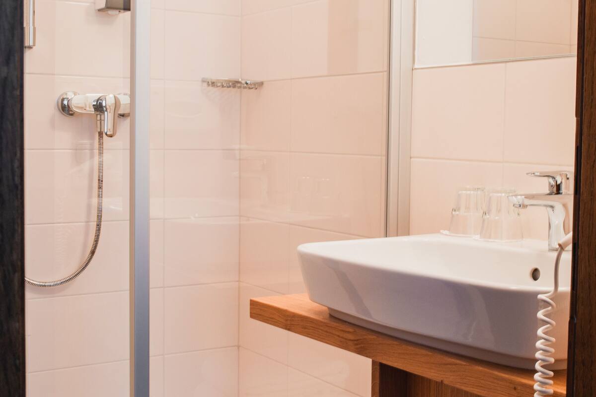 double room | bathroom | shower, hair dryer, towels