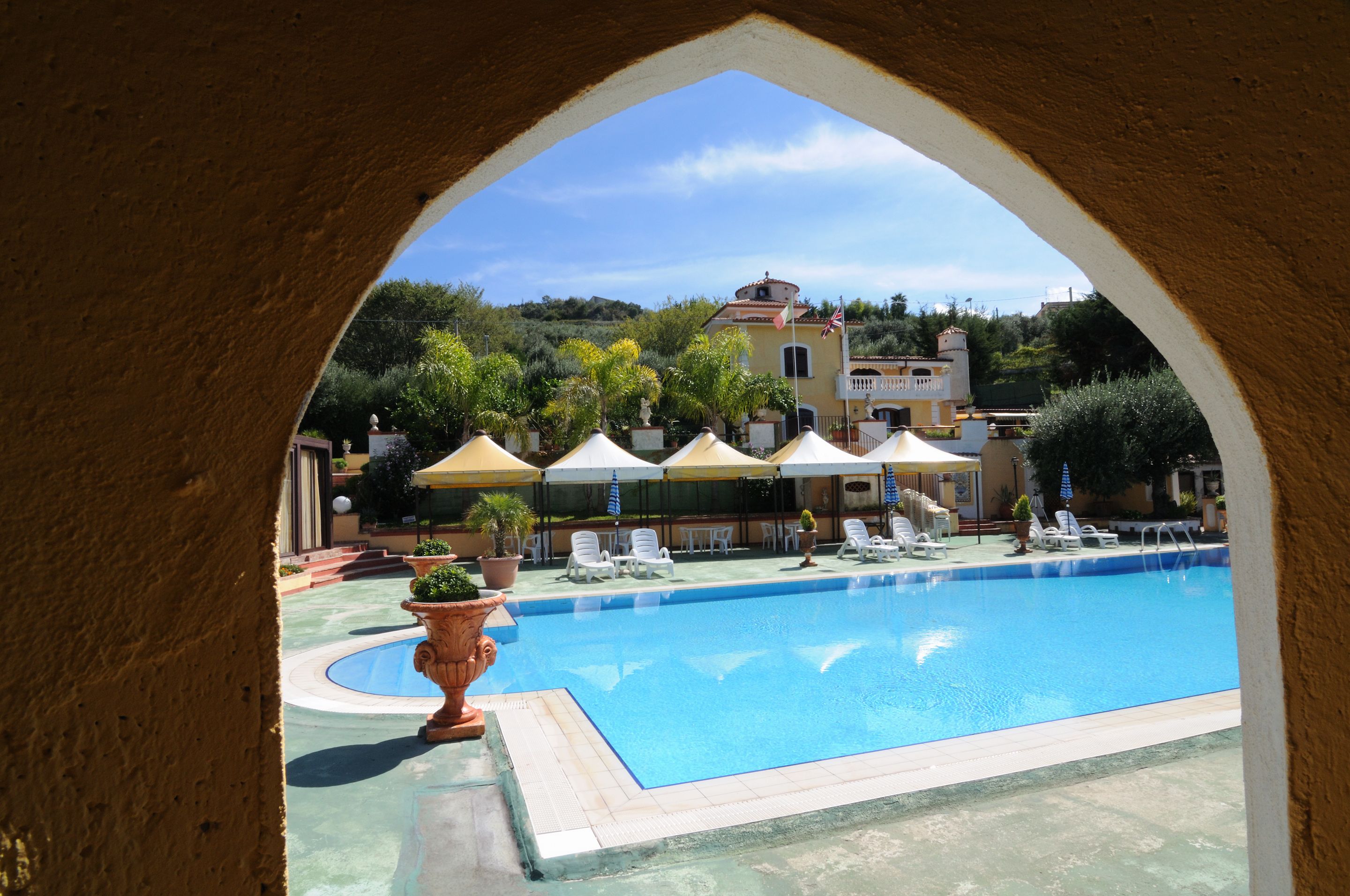 seasonal outdoor pool, open 8:00 am to 7:30 pm, pool umbrellas