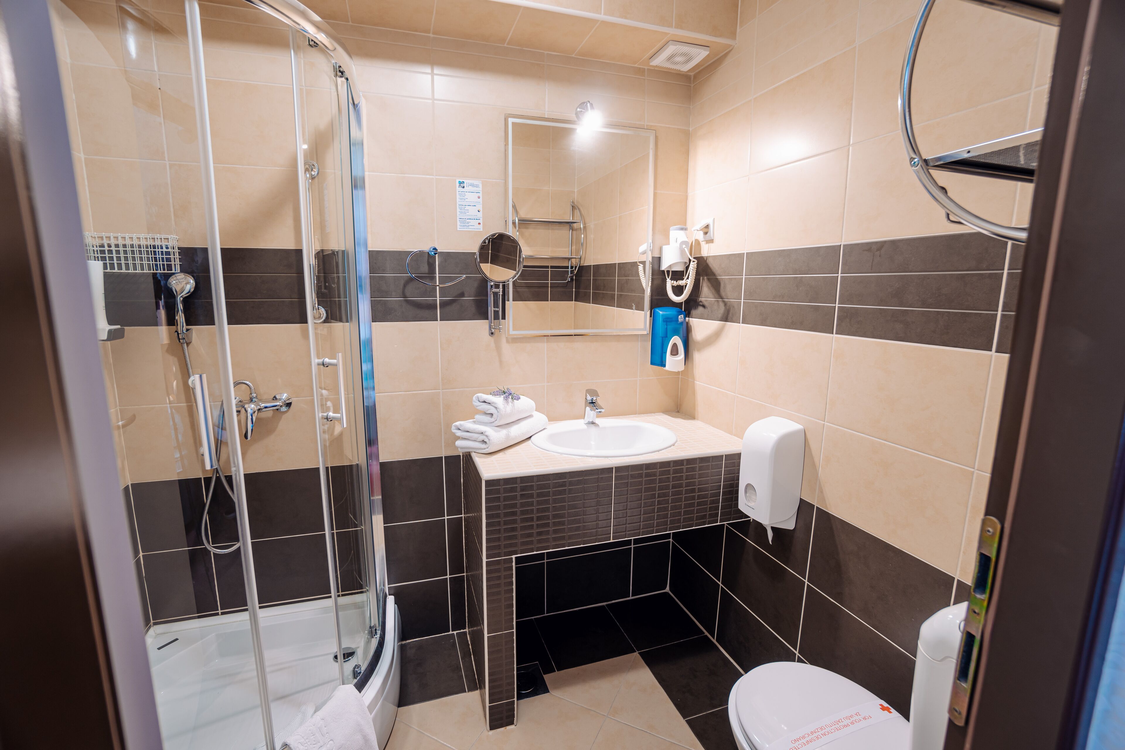 shower, free toiletries, hair dryer, towels