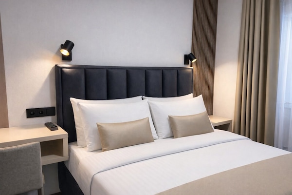 Ropa de cama de alta calidad, escritorio, insonorización y wifi gratis