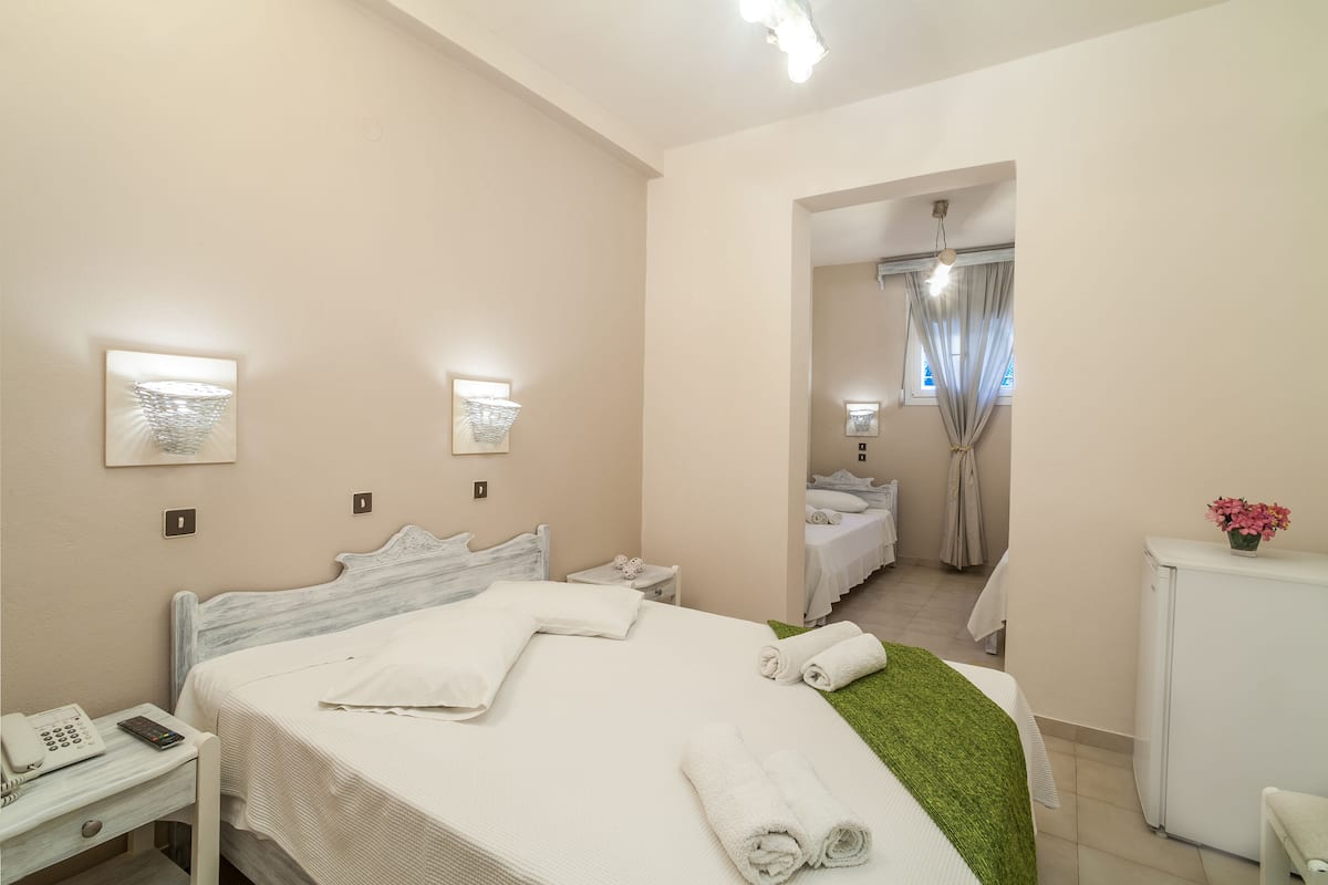 Standard Quadruple Room, Multiple Beds | 1 bedroom, in-room safe, soundproofing, iron/ironing board