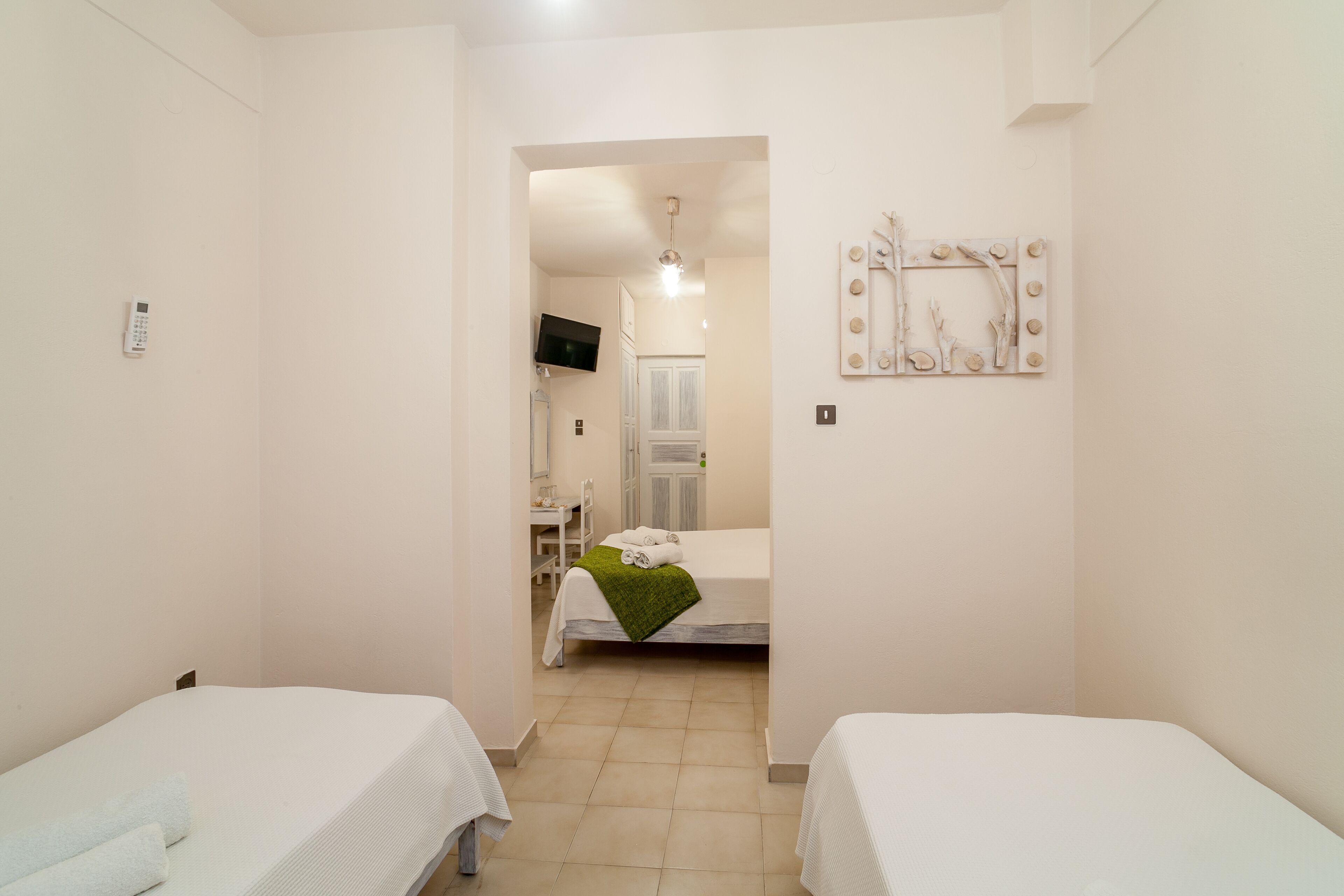 standard quadruple room, multiple beds | in-room safe, soundproofing, iron/ironing board, free wifi