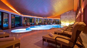 Indoor pool, seasonal outdoor pool, pool umbrellas, pool loungers