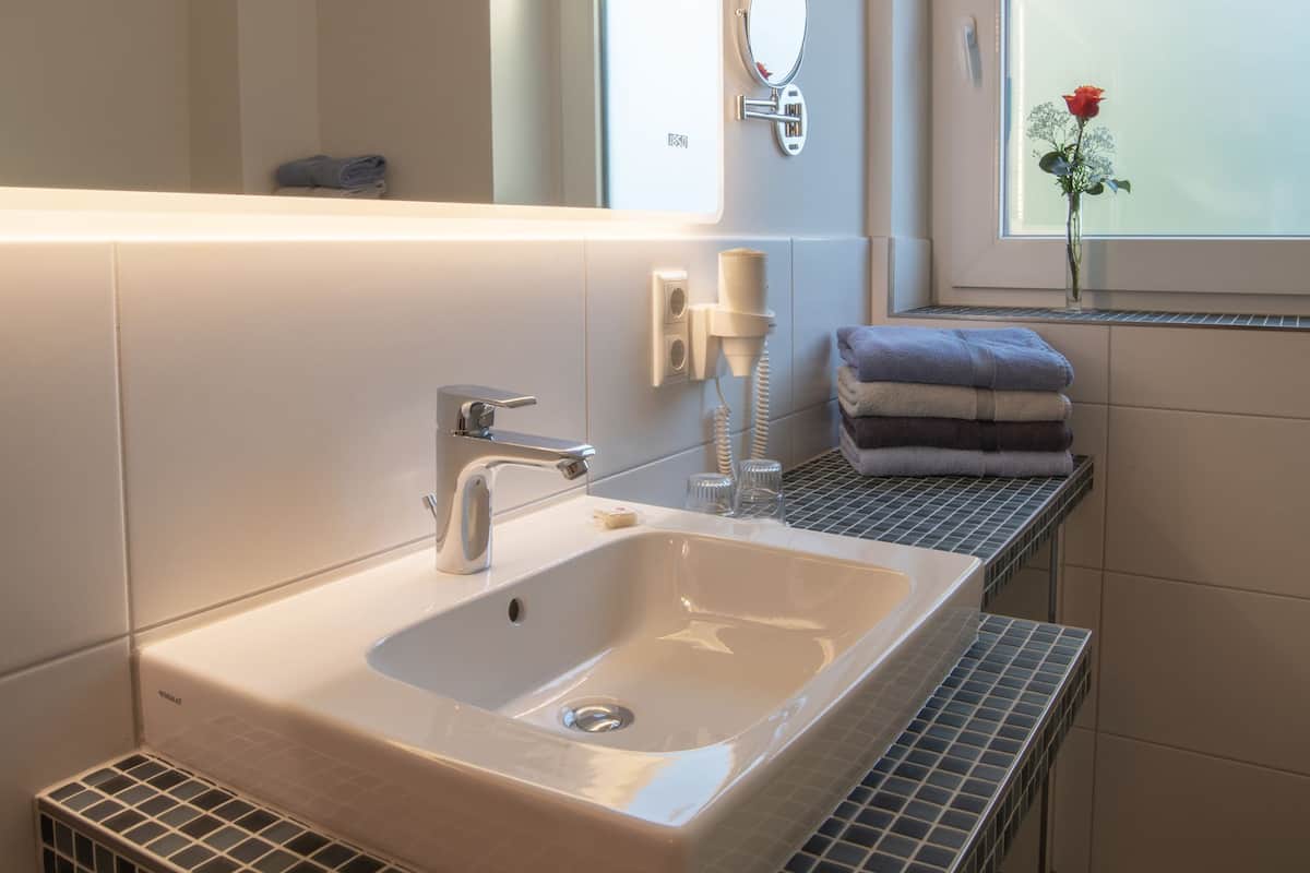 shower, eco-friendly toiletries, towels