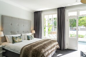 Luxury Room, Pool View | Premium bedding, minibar, in-room safe, desk