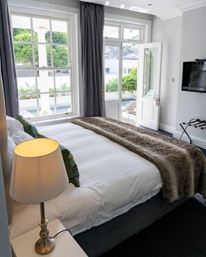 Luxury Room, Pool View | Premium bedding, minibar, in-room safe, desk - The Three Boutique Hotel (Cape Town)