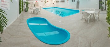 Indoor pool, sun loungers