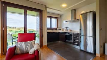 Deluxe Apartment, 1 Double Bed with Sofa bed | Living area | LCD TV