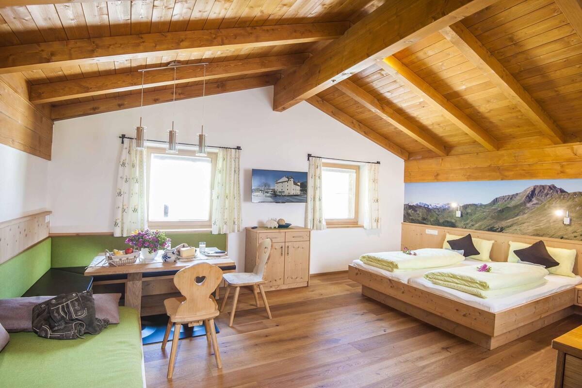 standard apartment, 2 bedrooms, kitchenette, mountain view (schwalbennest) | living area | flat-screen tv