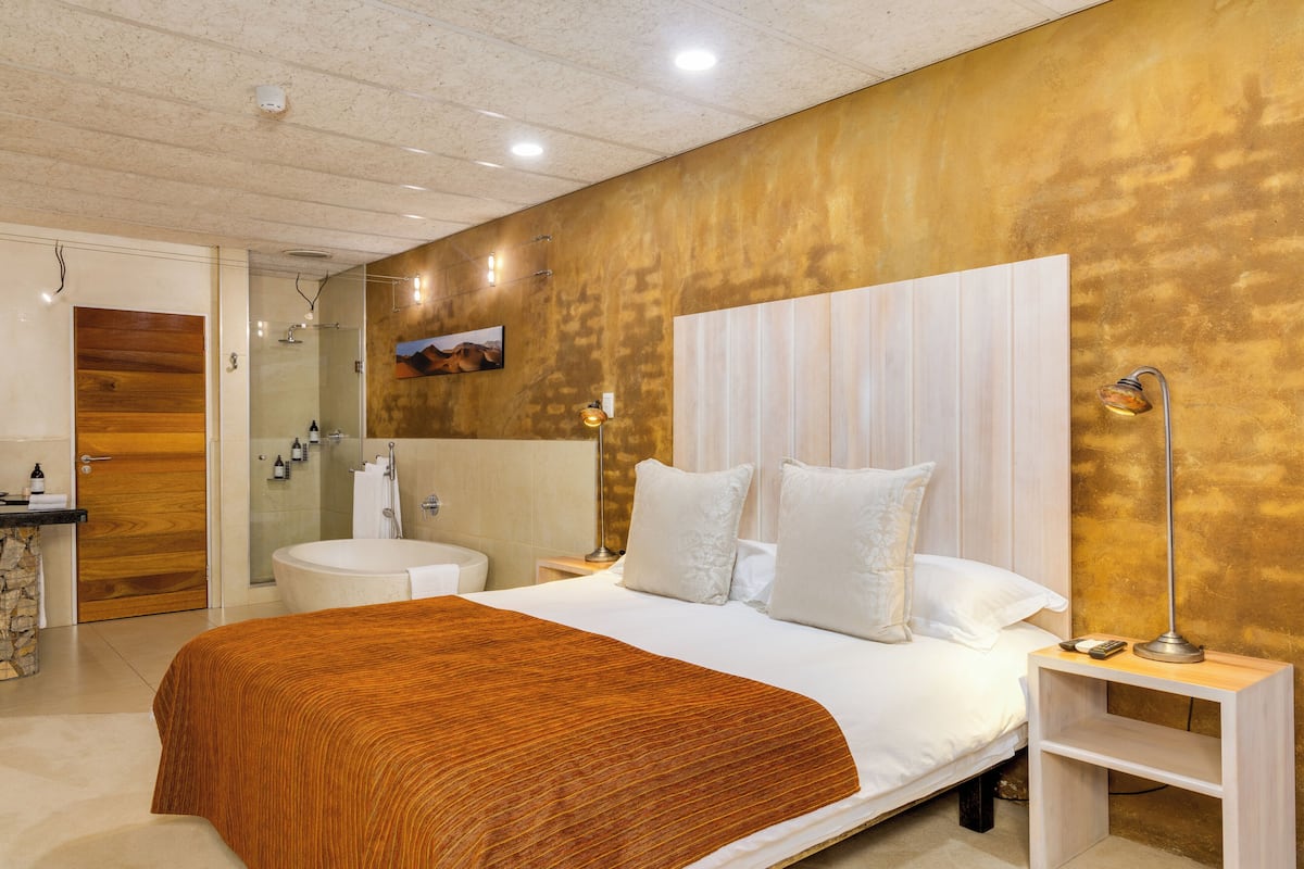 Luxury Suite | Premium bedding, in-room safe, iron/ironing board, free WiFi
