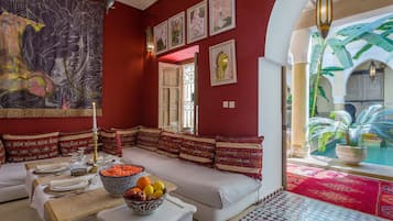 Breakfast, lunch, dinner served; international cuisine, pool views