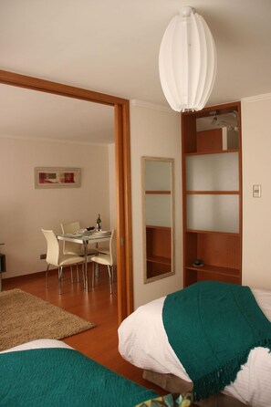 Down comforters, pillowtop beds, minibar, in-room safe - Mela Blu Apartments (SANTIAGO)