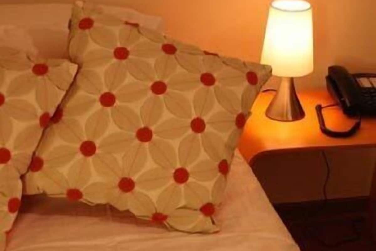 Apartamento standard | Edredons de pluma, camas com colchões pillow-top, frigobar