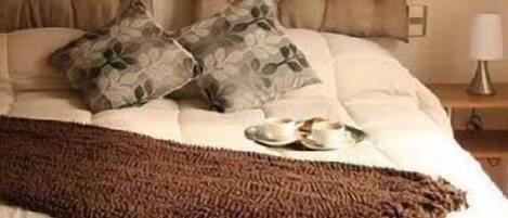Down duvets, pillow-top beds, minibar, in-room safe