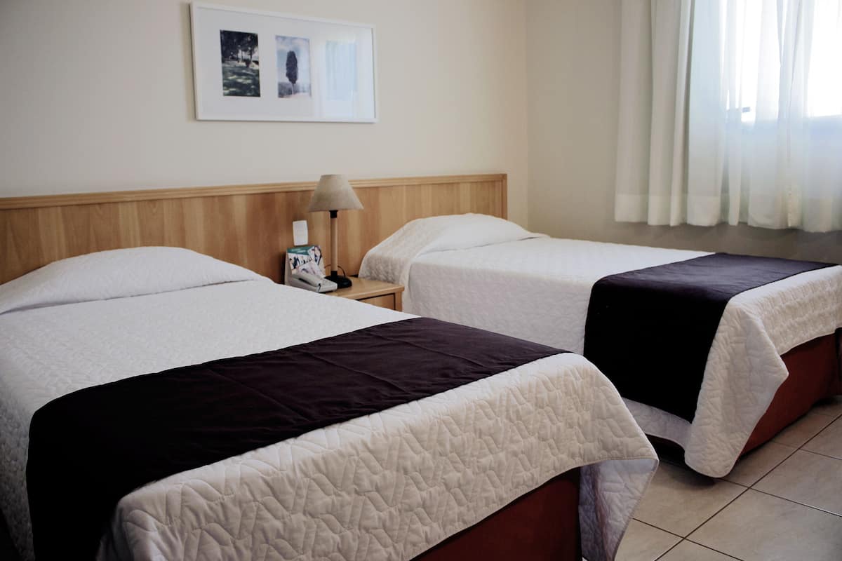 Desk, laptop workspace, blackout drapes, soundproofing