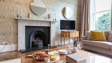 Apartment, 3 Bedrooms | Living room | Flat-screen TV, DVD player, iPod dock