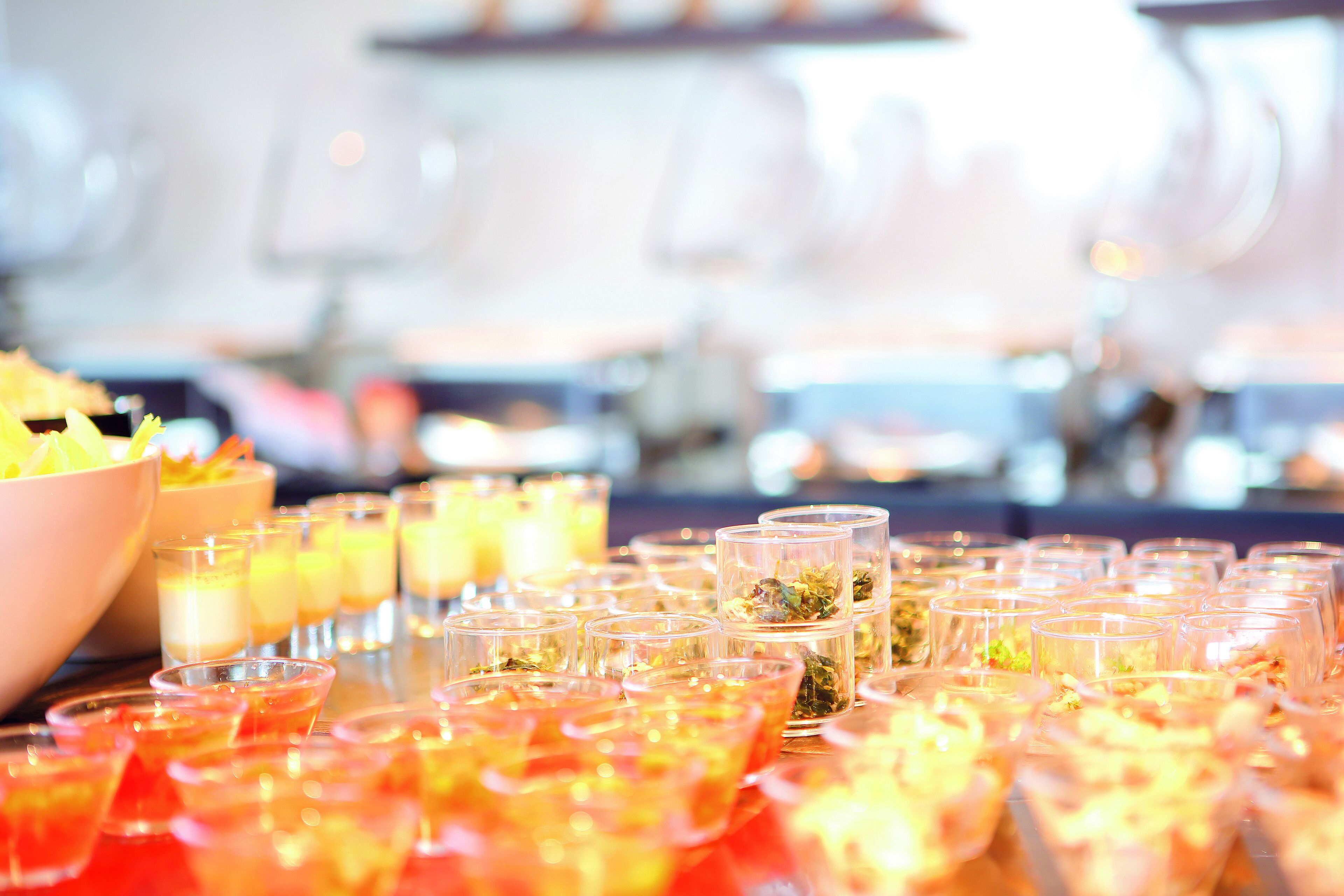 A buffet with various dishes and drinks.