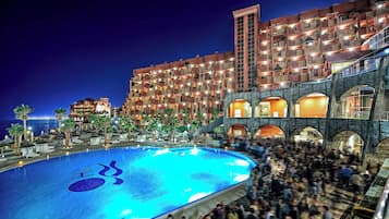 Indoor pool, outdoor pool, pool umbrellas, pool loungers