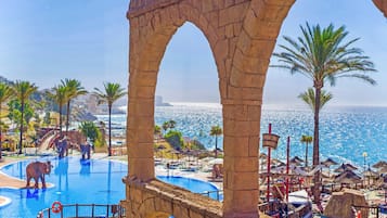 Indoor pool, outdoor pool, pool umbrellas, sun loungers