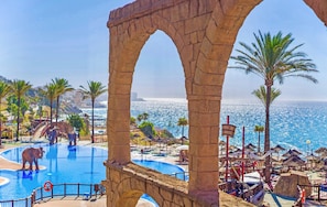 Indoor pool, outdoor pool, pool umbrellas, sun loungers