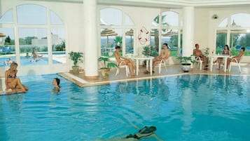 Indoor pool, outdoor pool, pool umbrellas, pool loungers