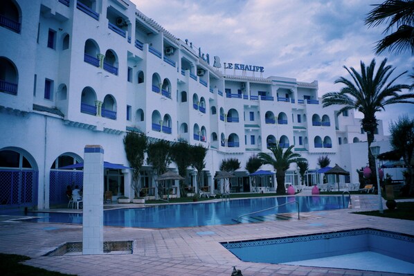 Indoor pool, outdoor pool, pool umbrellas, pool loungers