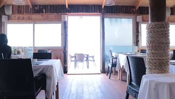 Breakfast, lunch, dinner served; international cuisine, garden views