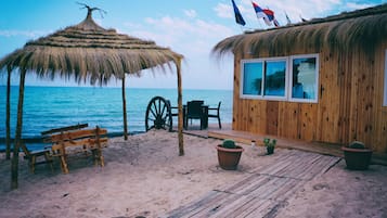 Private beach nearby, sun-loungers, beach umbrellas