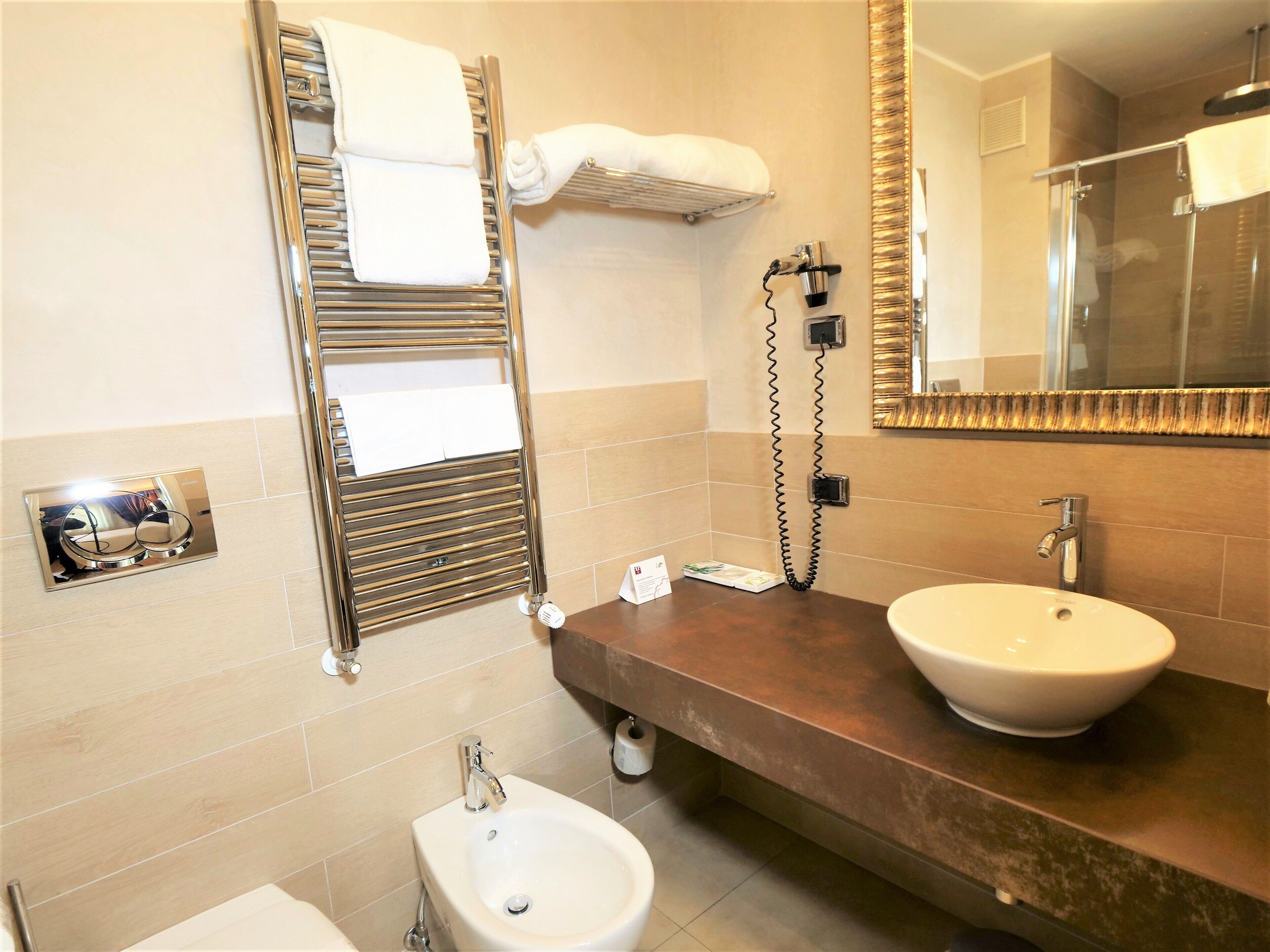 economy double room | bathroom | hair dryer, bidet, towels, soap
