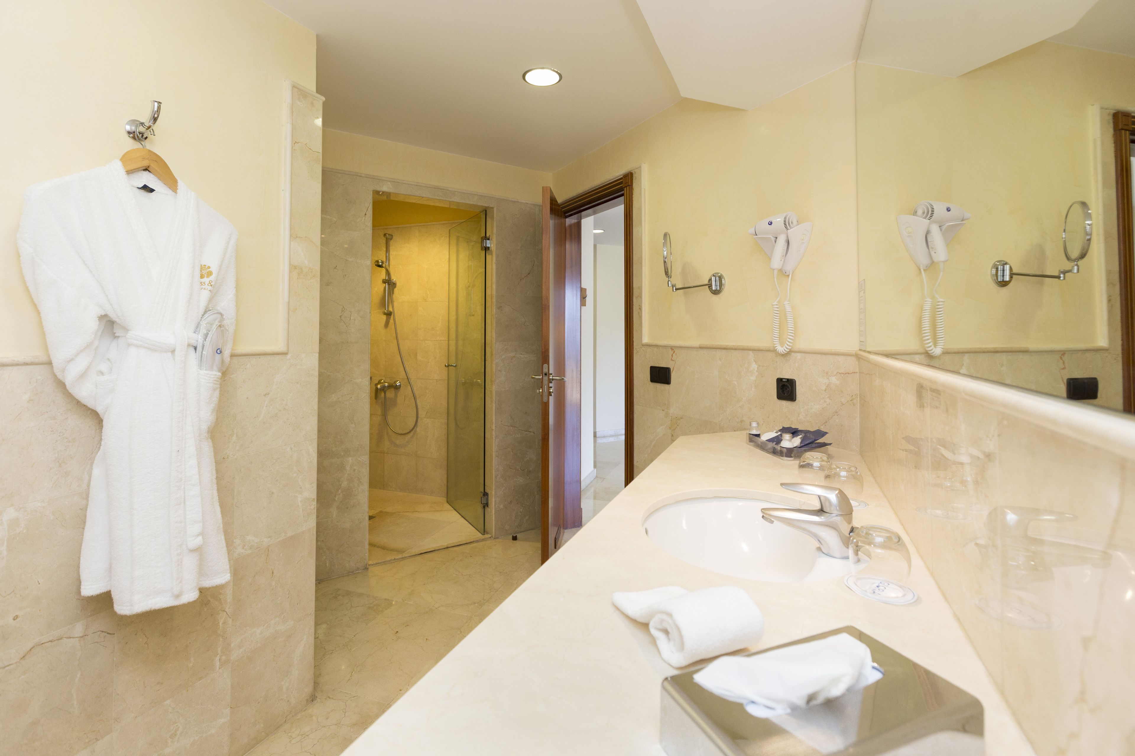 separate bathtub and shower, free toiletries, hair dryer, bathrobes