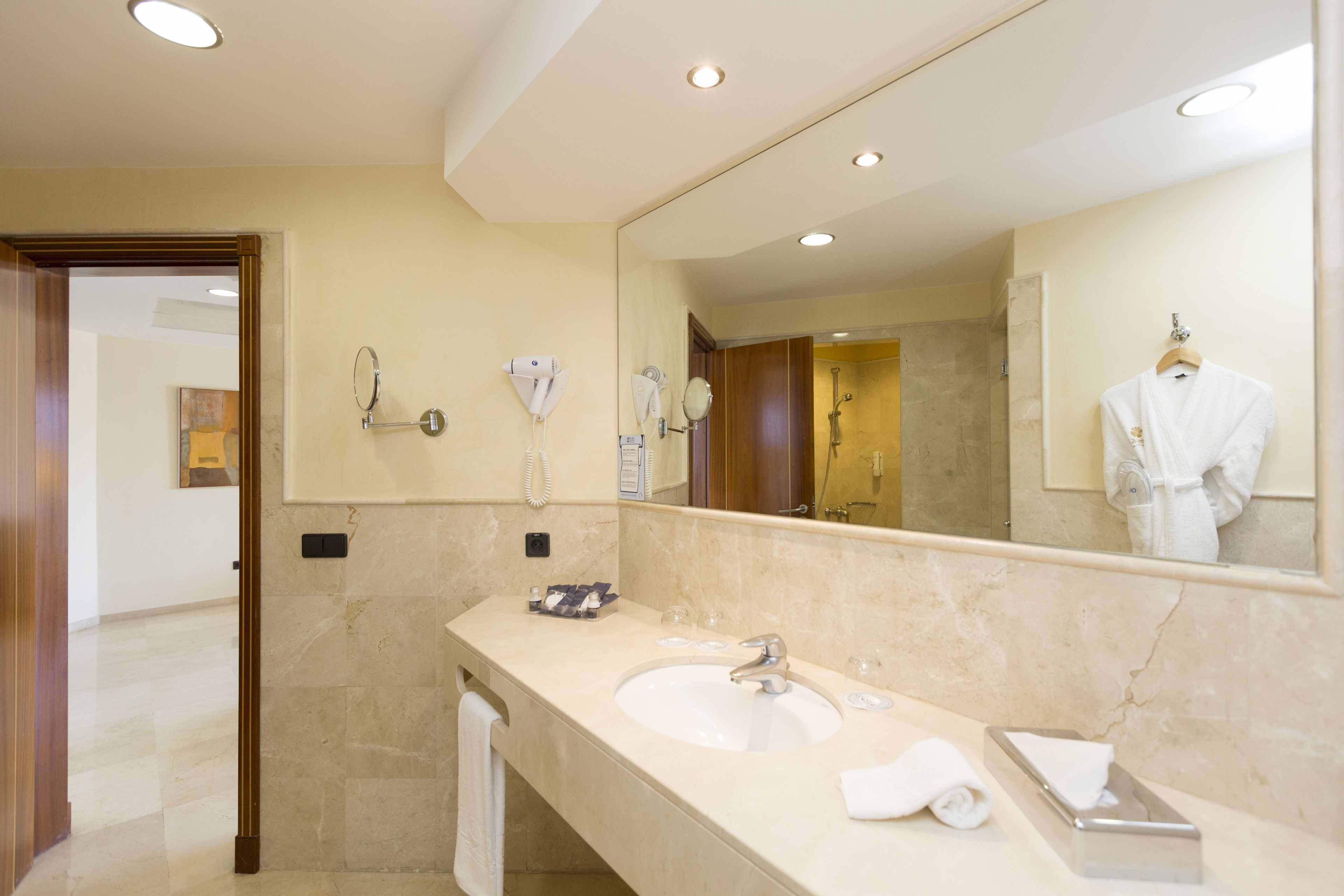 separate bathtub and shower, free toiletries, hair dryer, bathrobes