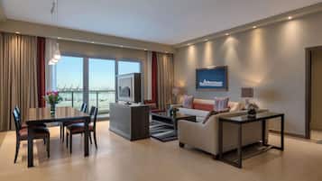Apartment, 3 Bedrooms | Living area | 43-inch Smart TV with cable channels, TV