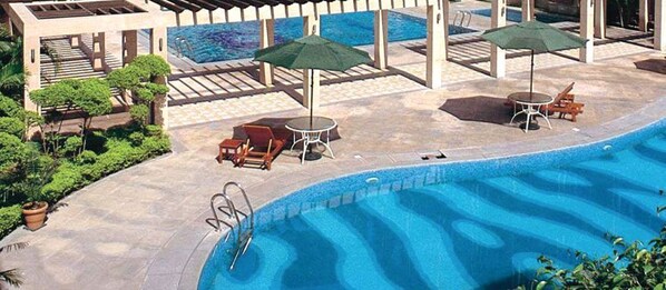 Outdoor pool, pool umbrellas, pool loungers