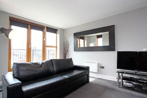 32-inch flat-screen TV with digital channels, TV