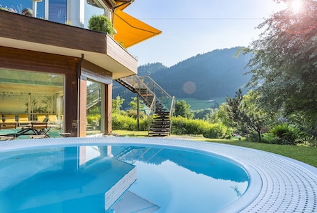 Indoor pool, outdoor pool, pool umbrellas, sun loungers