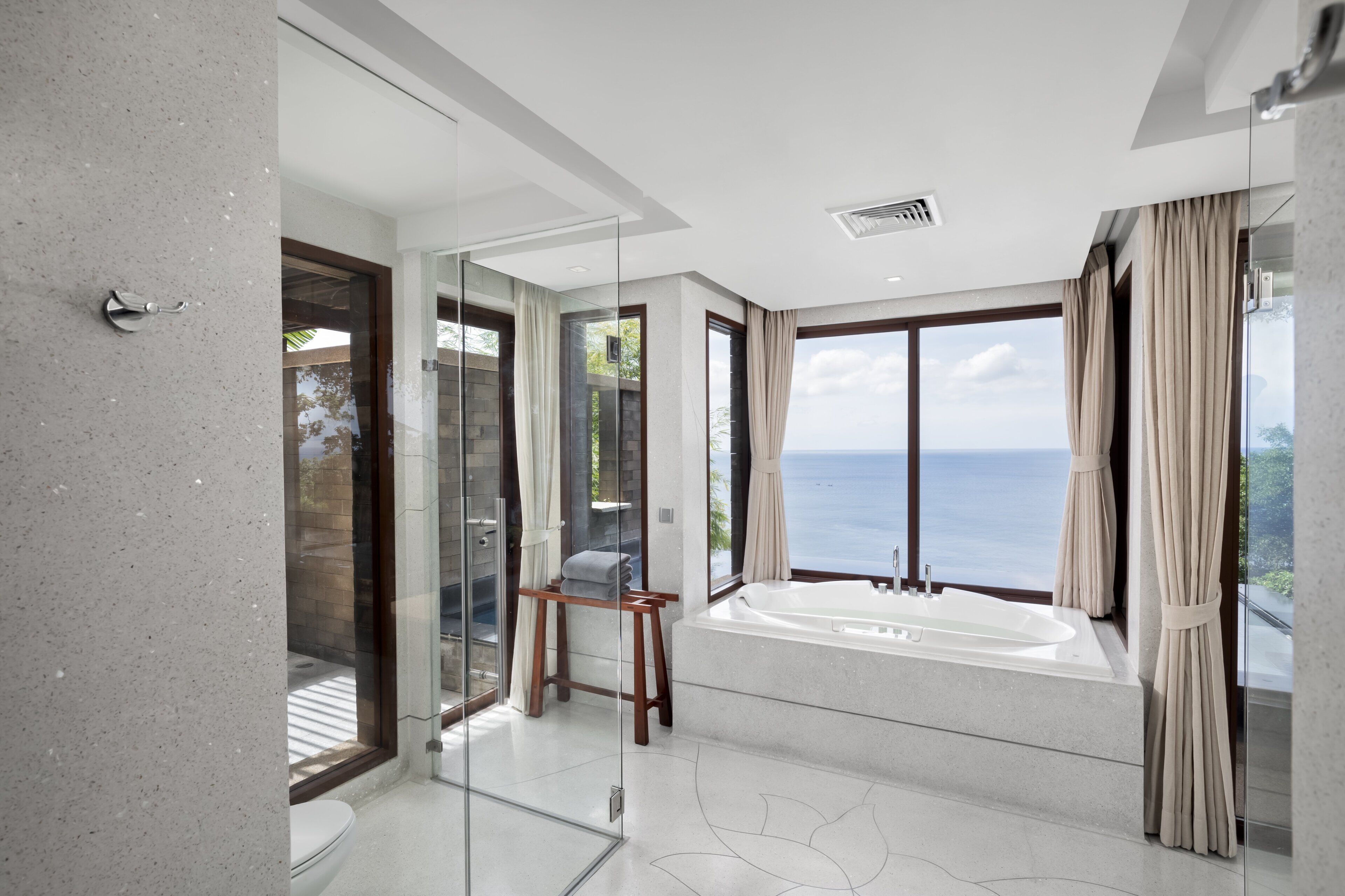 ocean pool suite | bathroom | separate bathtub and shower, deep-soaking bathtub, rainfall showerhead
