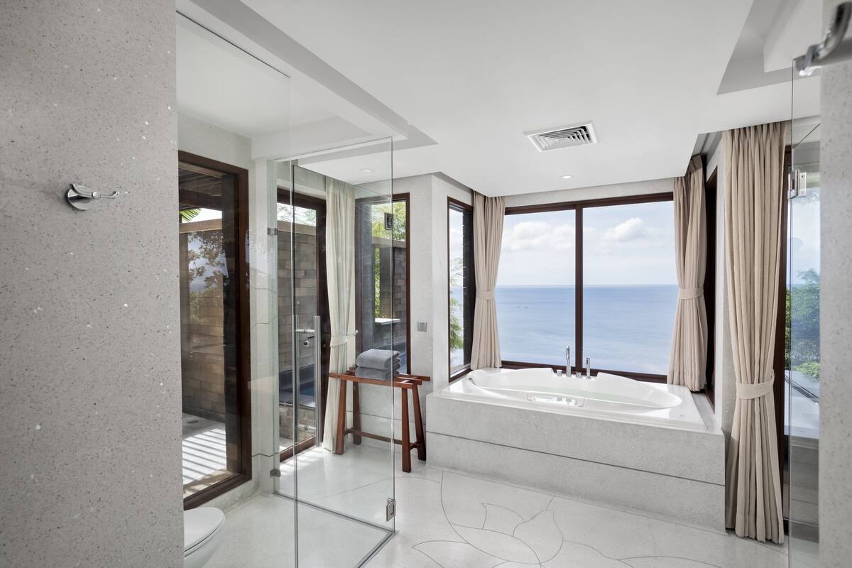 ocean pool suite | bathroom | separate bathtub and shower, deep-soaking bathtub, rainfall showerhead