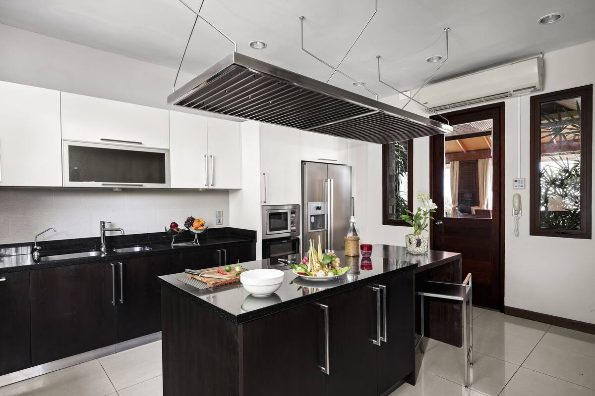 grand residence pool villa | private kitchen | espresso maker, electric kettle, dining tables