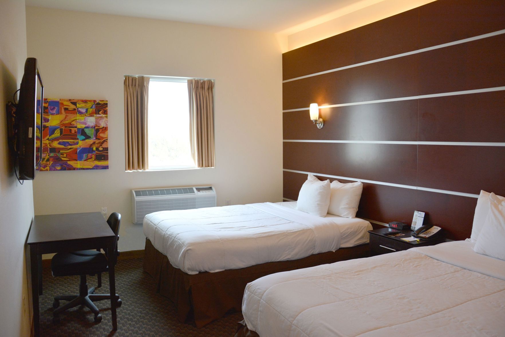 In-room safe, desk, iron/ironing board, free cribs/infant beds