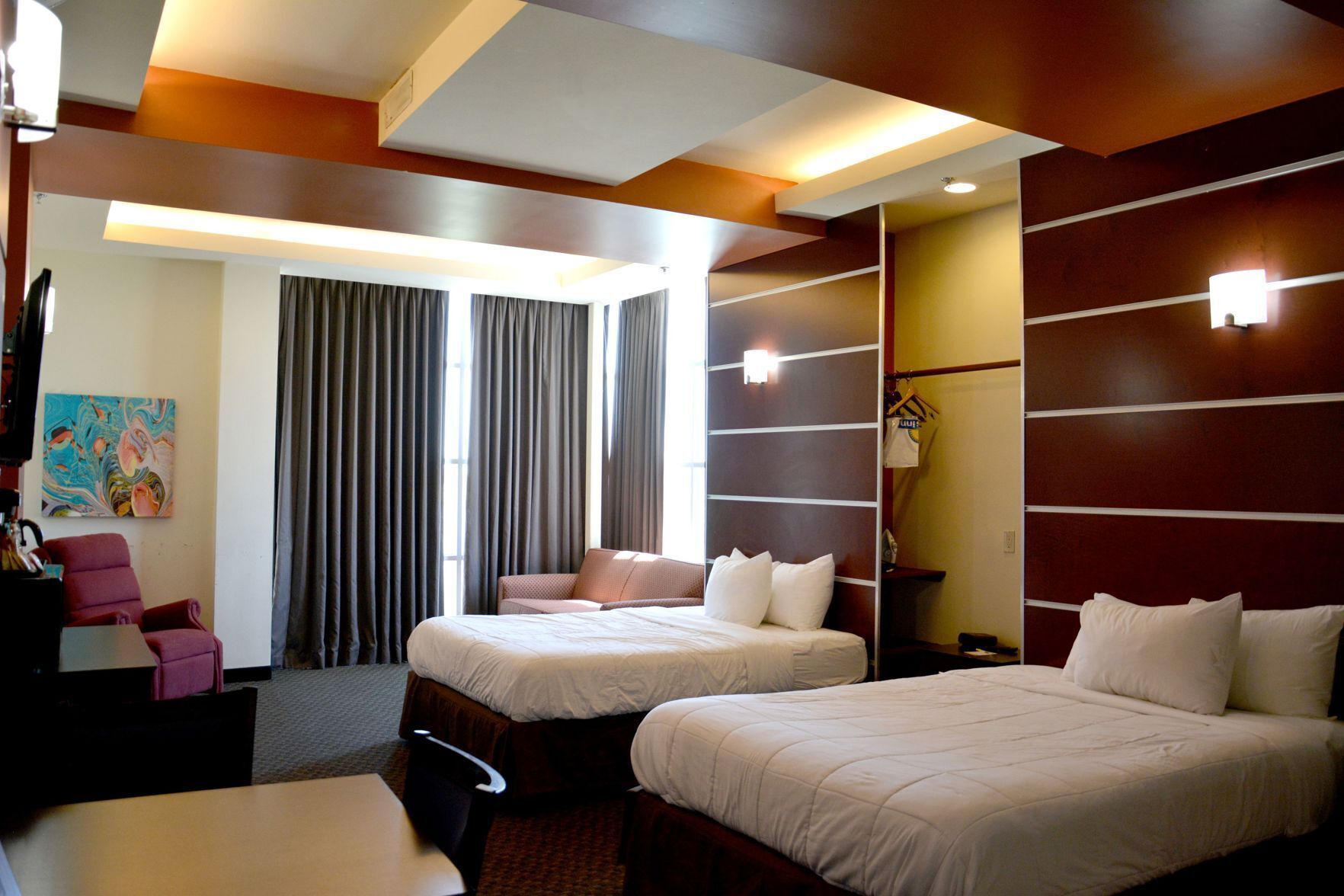 In-room safe, desk, iron/ironing board, free cribs/infant beds