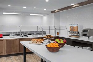 Daily buffet breakfast (USD 16 per person)