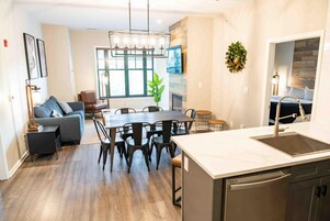 Premium Suite, 2 Bedrooms, Kitchen | Living area | 55-inch TV with cable channels, table tennis