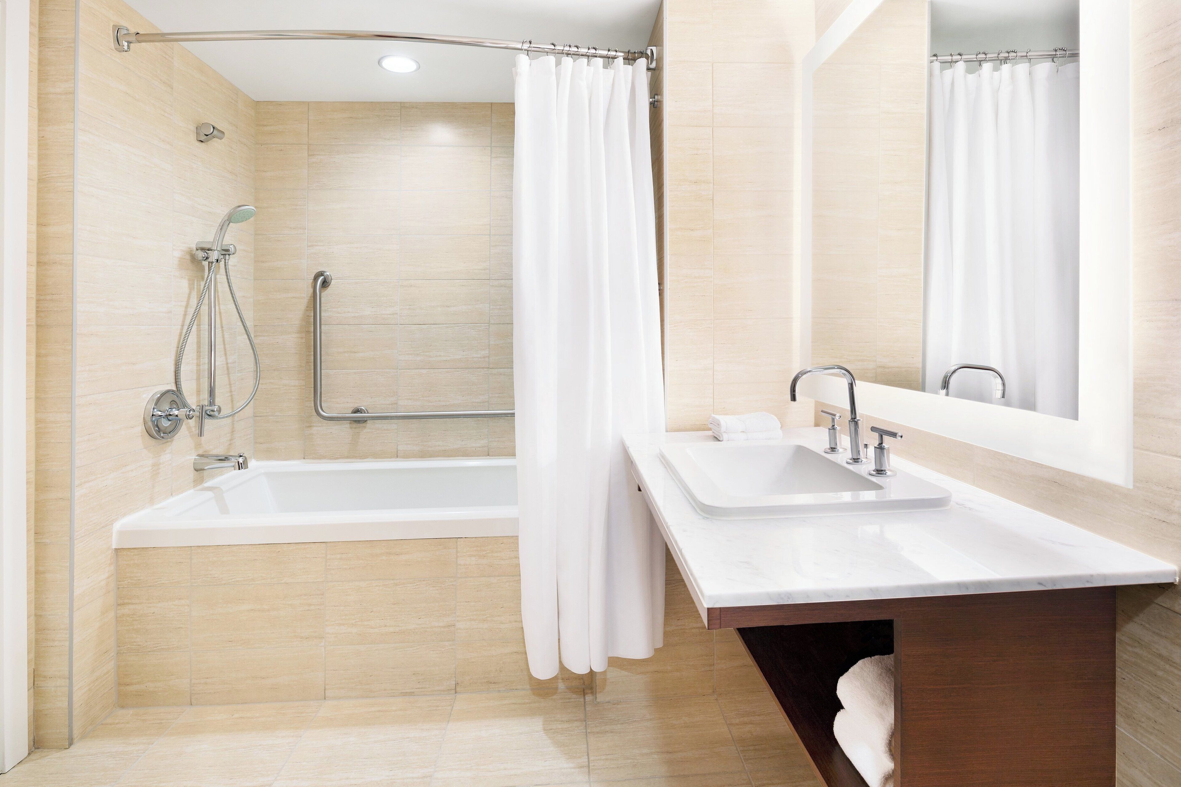 separate bathtub and shower, deep-soaking bathtub, free toiletries